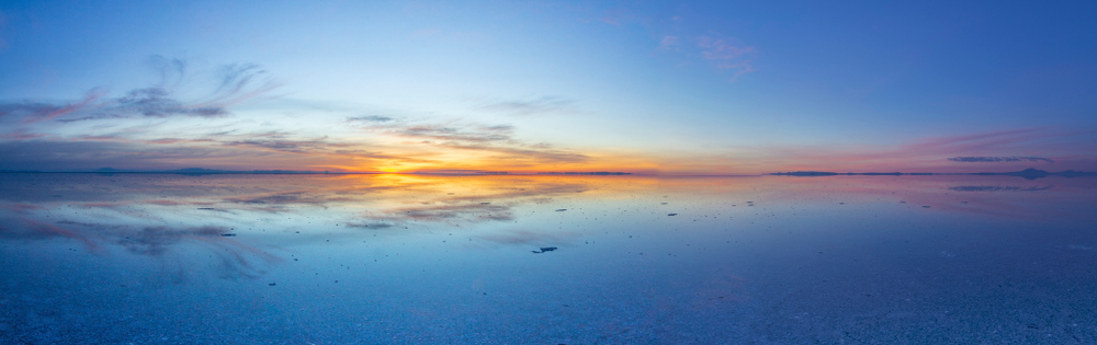 Surreal horizon view with sunset where ocean meets sky.